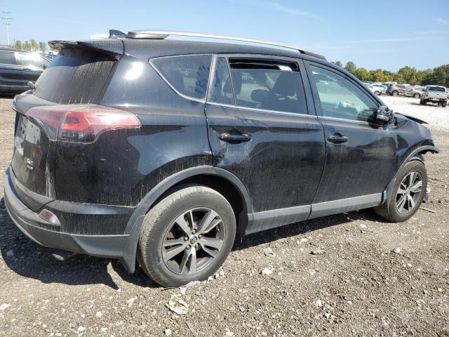 Photo 3 from auction – 2017 TOYOTA RAV4 XLE with VIN 2T3RFREV0HW652736