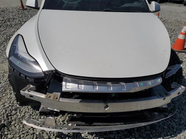 Photo 11 from auction – 2020 TESLA MODEL Y with VIN 5YJYGDEE1LF042239
