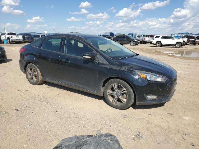 Photo 4 from auction – 2017 FORD FOCUS SE with VIN 1FADP3FE9HL331869