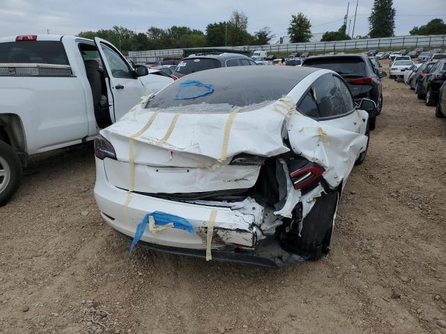 Photo 3 from auction – 2021 TESLA MODEL 3 with VIN 5YJ3E1EB8MF984214