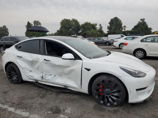 Photo 4 from auction – 2021 TESLA MODEL 3 with VIN 5YJ3E1ECXMF079174