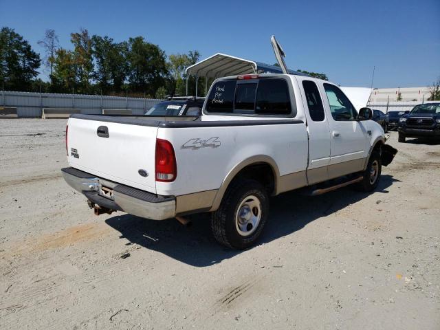 Photo 3 from auction – 2000 FORD F150 with VIN 1FTRX18L3YNA46962