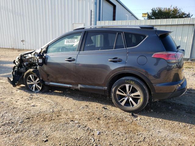 Photo 2 from auction – 2017 TOYOTA RAV4 XLE with VIN JTMWFREV7HD098157