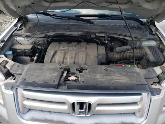 Photo 12 from auction – 2006 HONDA PILOT LX with VIN 2HKYF18186H503484