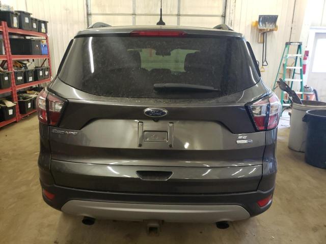 Снимка 6 от търг – 2018 FORD ESCAPE SE с VIN 1FMCU9GD8JUC60005