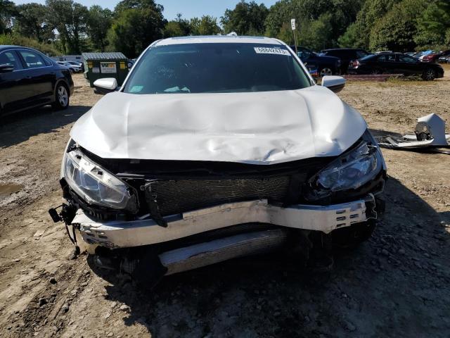 Photo 5 from auction – 2018 HONDA CIVIC SI with VIN 2HGFC1E53JH706552