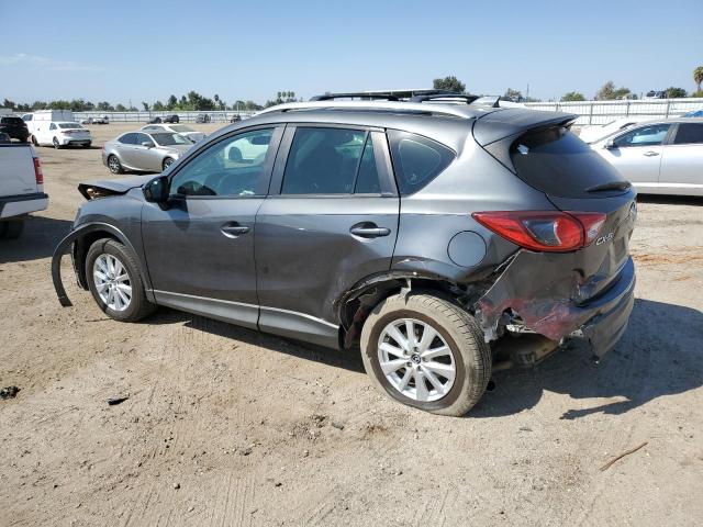 Photo 2 from auction – 2014 MAZDA CX-5 SPORT with VIN JM3KE2BE4E0331578