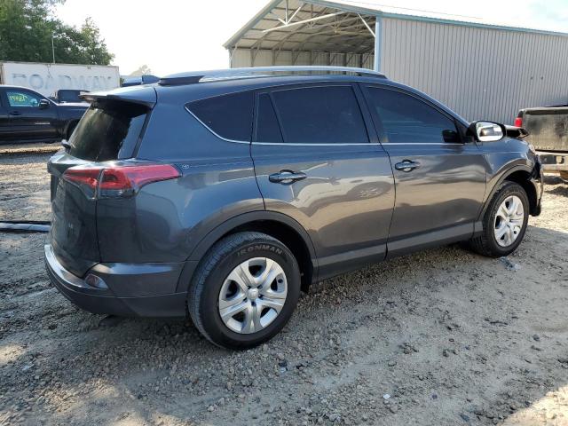 Photo 3 from auction – 2018 TOYOTA RAV4 LE with VIN 2T3ZFREV8JW452788