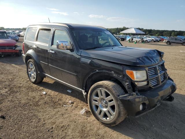 Photo 4 from auction – 2011 DODGE NITRO HEAT with VIN 1D4PU4GX2BW564037