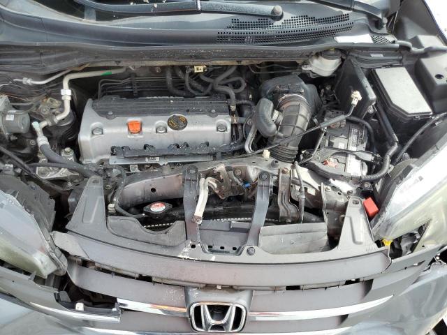 Photo 11 from auction – 2013 HONDA CRV with VIN 3CZRM3H30DG702827