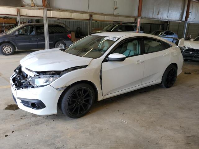HONDA CIVIC LX 2018 with VIN 2HGFC2F54JH533614 - Photo from auction
