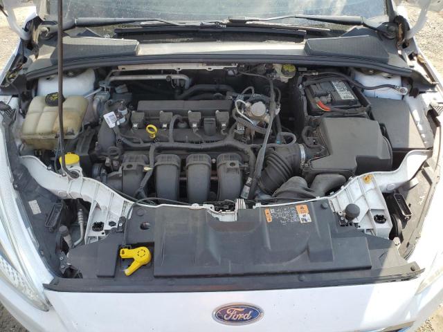 Photo 11 from auction – 2016 FORD FOCUS with VIN 1FADP3K26GL345383