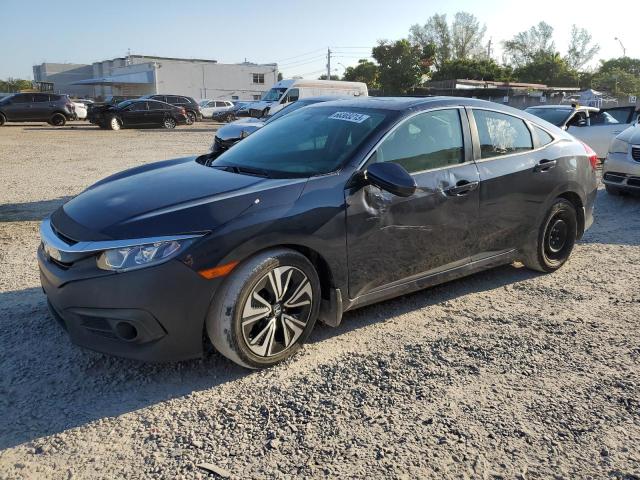 HONDA CIVIC EX 2017 with VIN 19XFC1E35HE031953 - Photo from auction