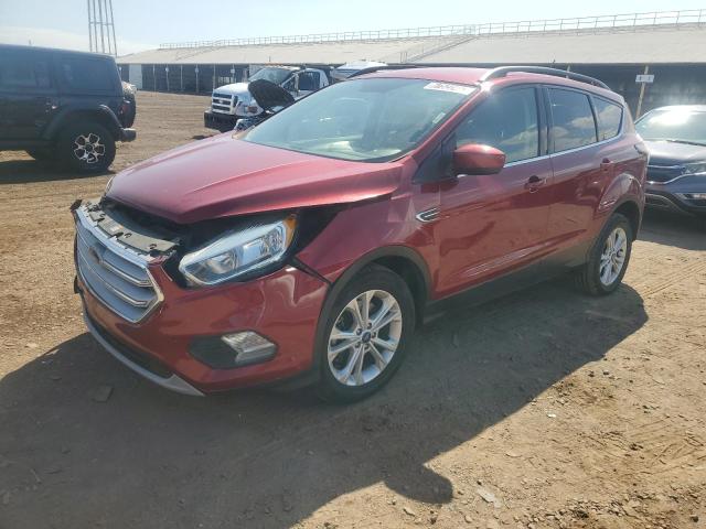 FORD ESCAPE SE 2018 with VIN 1FMCU9GD2JUB41401 - Photo from auction