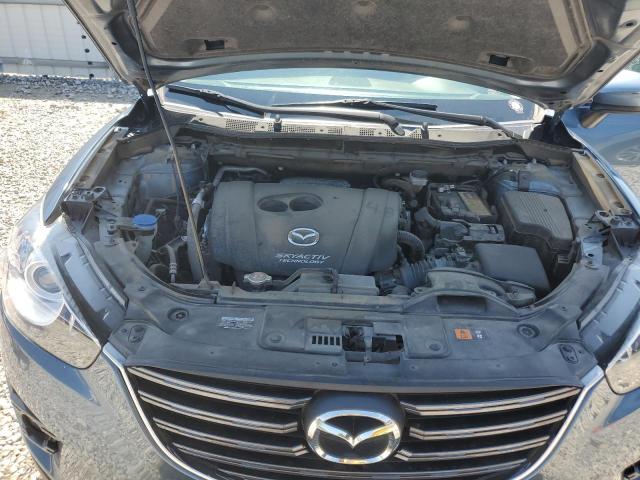 Photo 12 from auction – 2016 MAZDA CX-5 TOURI with VIN JM3KE4CY4G0910576