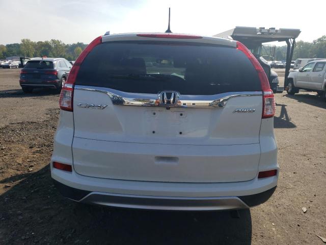 Photo 6 from auction – 2016 HONDA CR-V EXL with VIN 5J6RM4H71GL032852