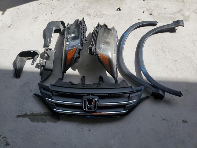 Photo 13 from auction – 2013 HONDA CR-V EX with VIN 5J6RM3H51DL047341