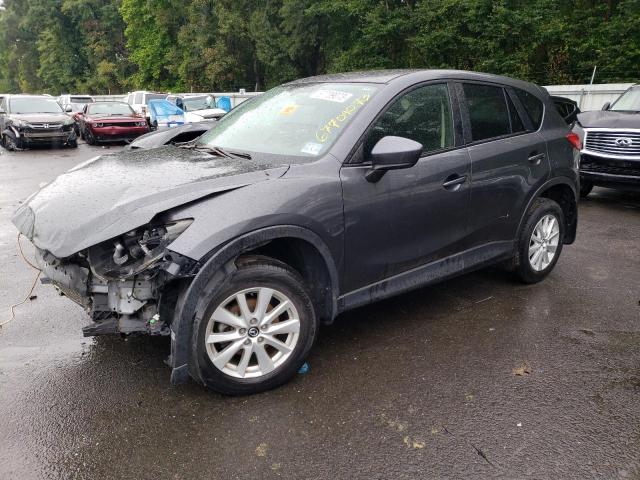 MAZDA CX-5 TOURI 2014 with VIN JM3KE2CY3E0385138 - Photo from auction