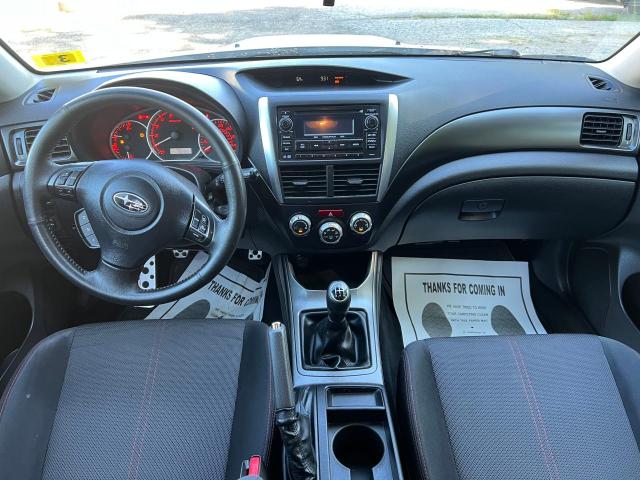 Снимка 9 от търг – 2012 SUBARU IMPREZA WR с VIN JF1GR7E68CG233295