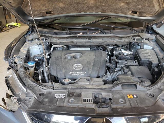Photo 12 from auction – 2015 MAZDA CX-5 GT with VIN JM3KE2DY2F0537345