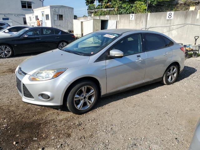 FORD FOCUS SE 2013 with VIN 1FADP3F21DL133058 - Photo from auction