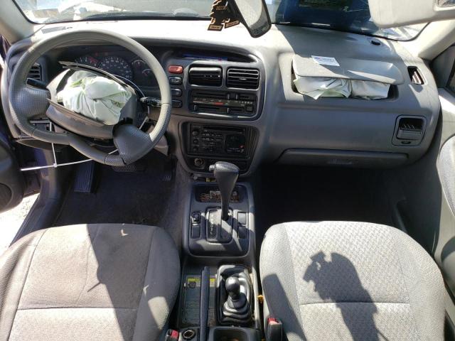 Photo 8 from auction – 1999 CHEVROLET TRACKER with VIN 2CNBJ13C2X6913194