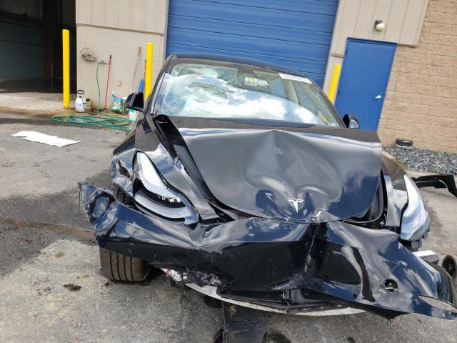 Photo 5 from auction – 2022 TESLA MODEL 3 with VIN 5YJ3E1EB3NF189797