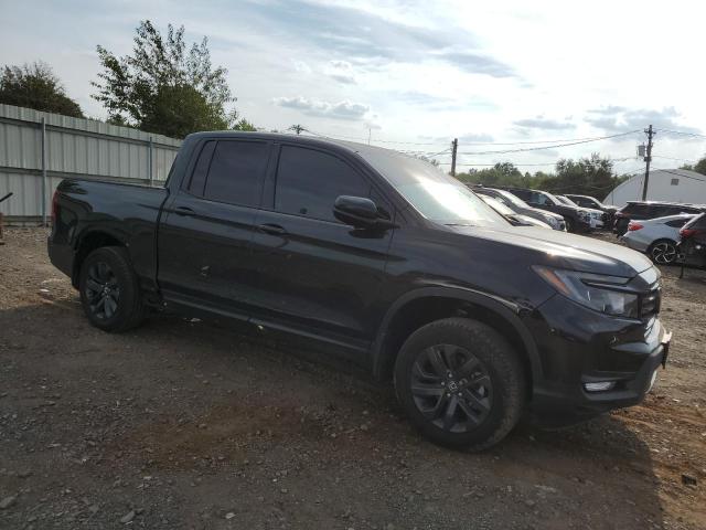 Photo 4 from auction – 2023 HONDA RIDGELINE with VIN 5FPYK3F17PB033773