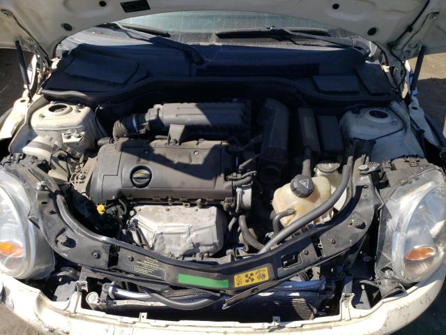 Снимка 11 от търг – 2009 MINI COOPER с VIN WMWMF33599TT69652