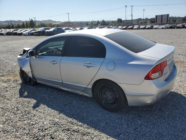 Photo 2 from auction – 2011 HONDA CIVIC LX with VIN 19XFA1F57BE044104