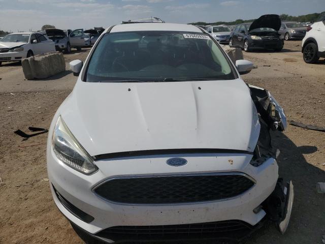 Photo 5 from auction – 2015 FORD FOCUS SE with VIN 1FADP3F25FL276629
