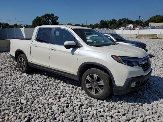 Photo 4 from auction – 2017 HONDA RIDGELINE with VIN 5FPYK3F62HB015520