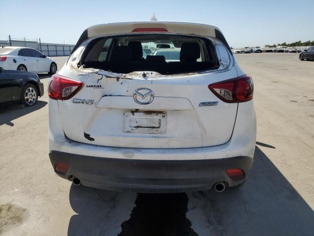 Photo 6 from auction – 2016 MAZDA CX-5 TOURI with VIN JM3KE2CY9G0809022