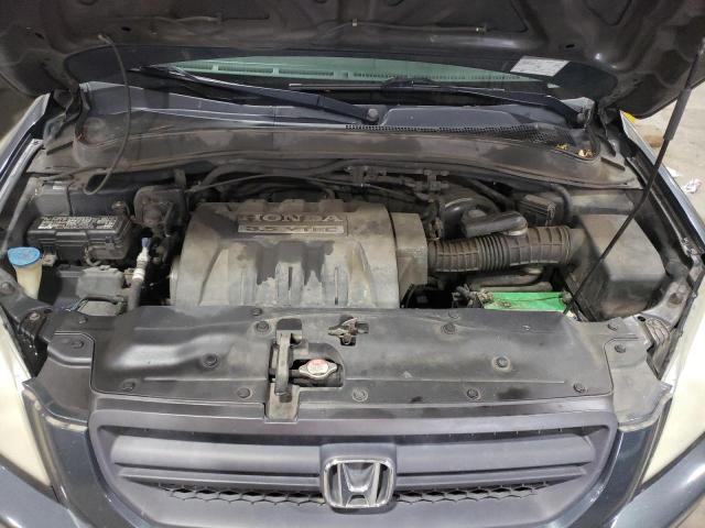 Photo 11 from auction – 2005 HONDA PILOT EX with VIN 2HKYF18455H502110