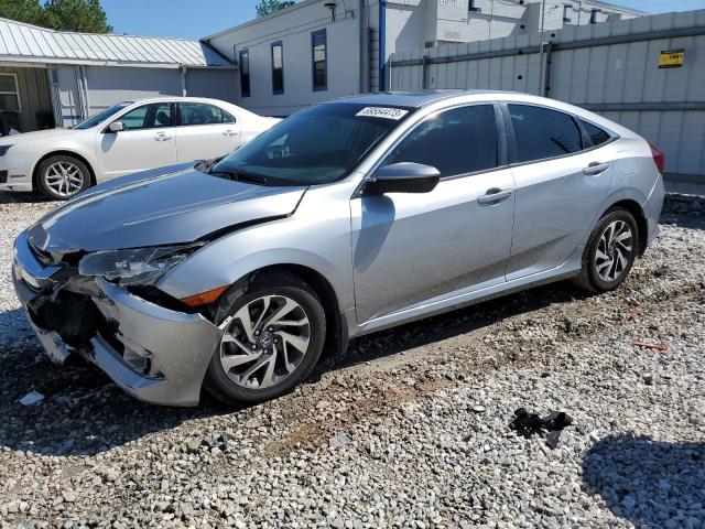 HONDA CIVIC EX 2018 with VIN 19XFC2F71JE041537 - Photo from auction