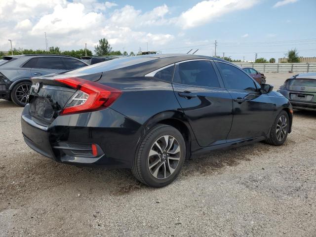 Photo 3 from auction – 2018 HONDA CIVIC LX with VIN 19XFC2F59JE007201