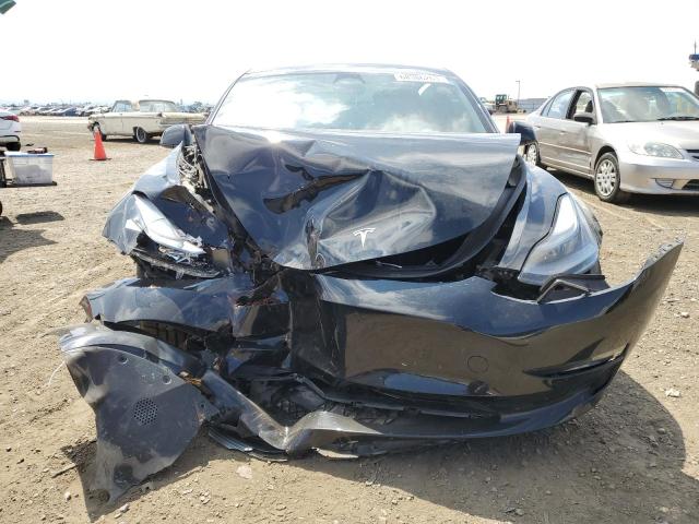 Photo 5 from auction – 2022 TESLA MODEL 3 with VIN 5YJ3E1EB1NF275044