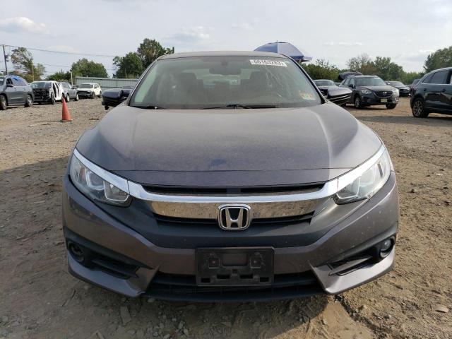 Photo 5 from auction – 2018 HONDA CIVIC EXL with VIN 2HGFC1F76JH643317