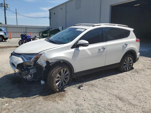 TOYOTA RAV4 LIMIT 2017 with VIN 2T3YFREV0HW319299 - Photo from auction