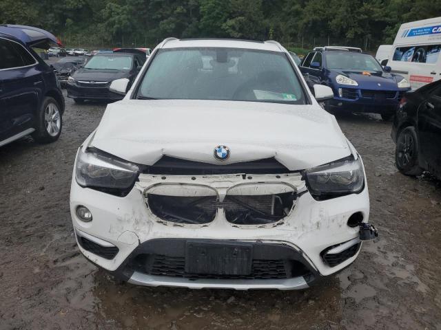 Photo 5 from auction – 2018 BMW X1 XDRIVE2 with VIN WBXHT3C30J5K27746