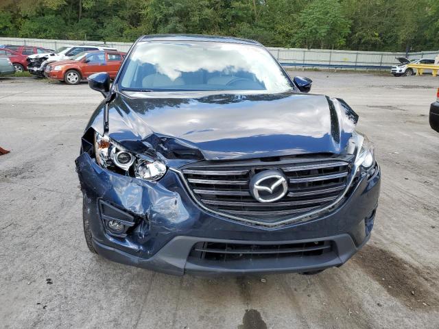 Photo 5 from auction – 2016 MAZDA CX-5 TOURI with VIN JM3KE4CY3G0656276