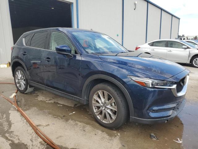 Photo 4 from auction – 2021 MAZDA CX-5 GRAND with VIN JM3KFADMXM0362540