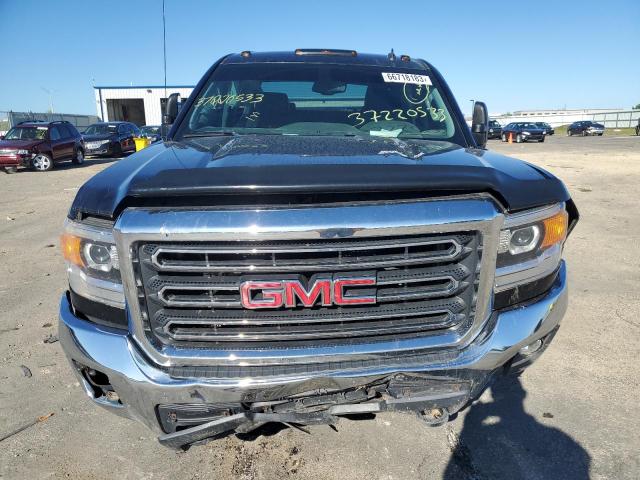 Photo 5 from auction – 2015 GMC SIERRA K25 with VIN 1GT12YE87FF190445