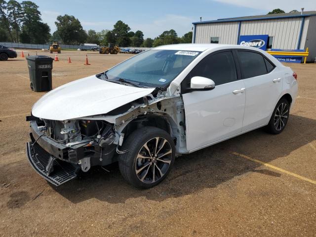 TOYOTA COROLLA L 2019 with VIN 5YFBURHEXKP911981 - Photo from auction