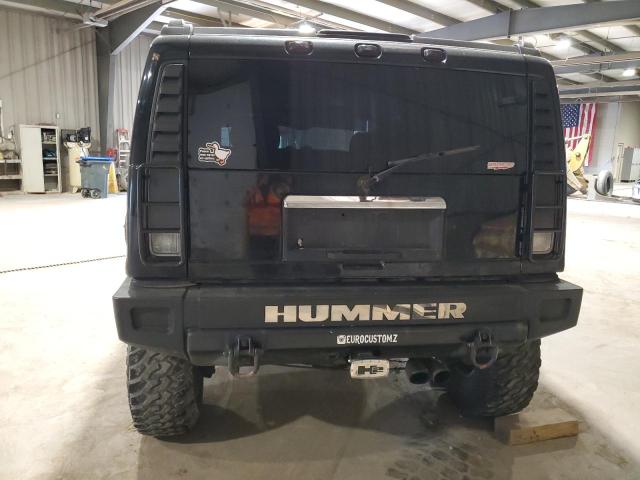 Фото 6 с аукциона – 2003 HUMMER H2 с VIN 5GRGN23U73H144711