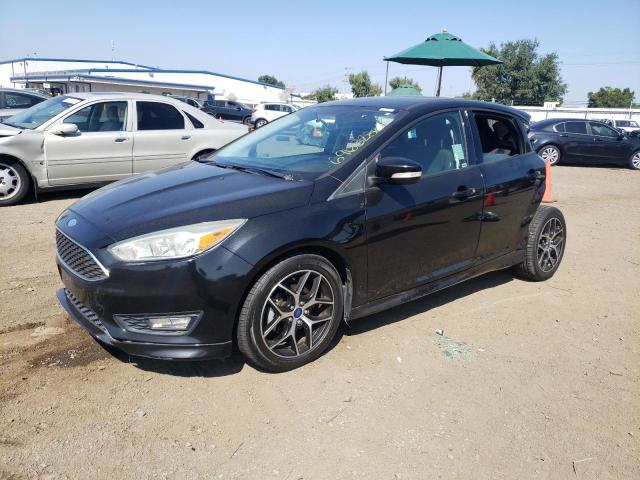 FORD FOCUS SE 2015 with VIN 1FADP3F21FL261836 - Photo from auction