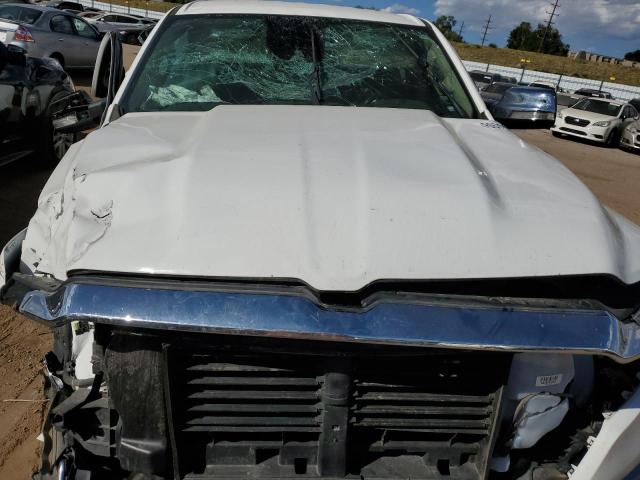 Photo 11 from auction – 2021 RAM 1500 LARAM with VIN 1C6SRFJT2MN660101