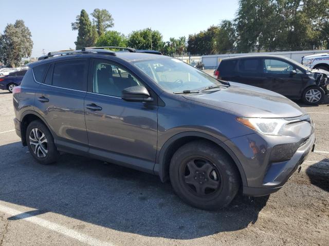 Photo 4 from auction – 2018 TOYOTA RAV4 LE with VIN JTMZFREV5JJ155461