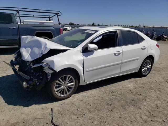 TOYOTA COROLLA L 2015 with VIN 5YFBURHE5FP240872 - Photo from auction
