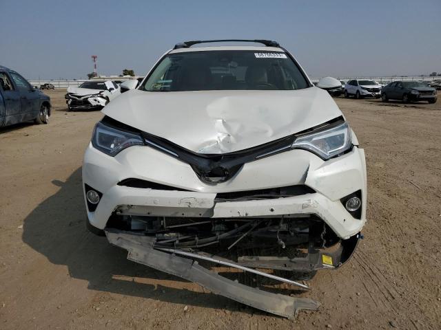 Photo 5 from auction – 2017 TOYOTA RAV4 LIMIT with VIN JTMYFREV8HJ128227